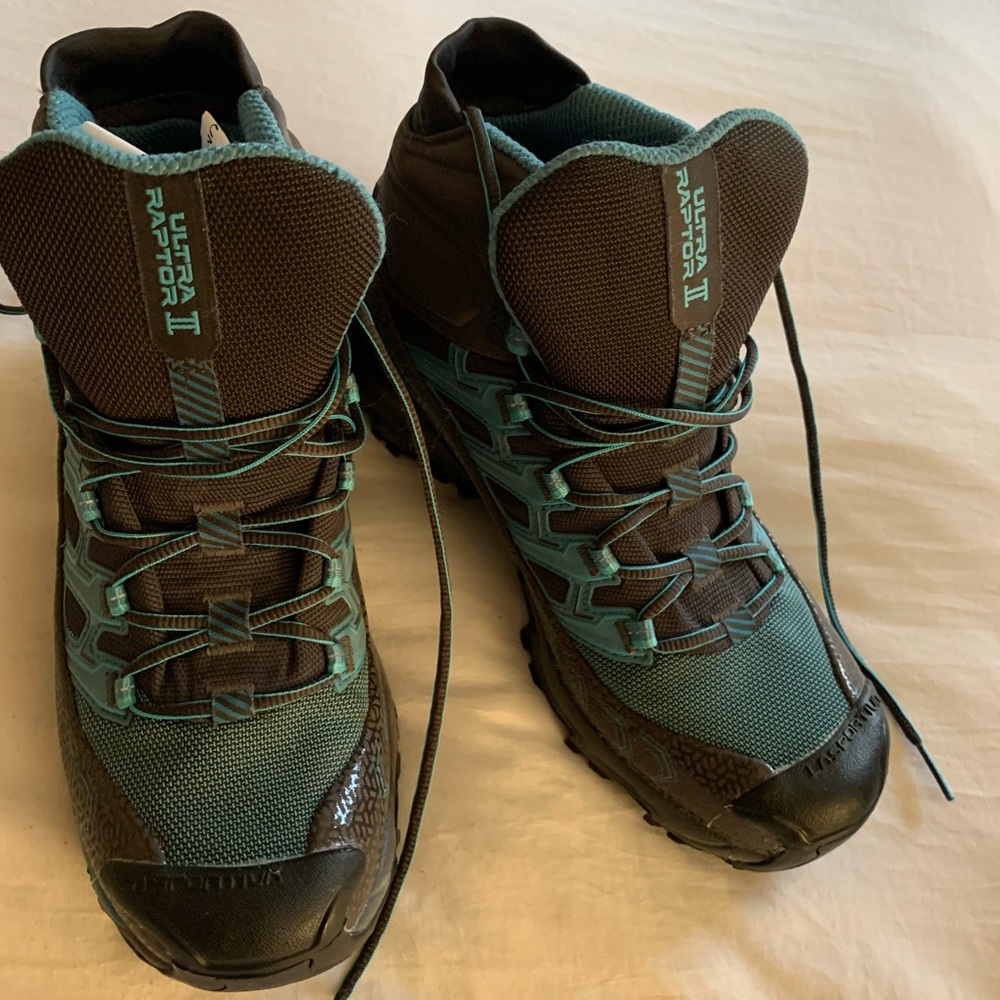 Never worn Women’s sz 9 LaSportiva hiking boots.Fits like 8.5